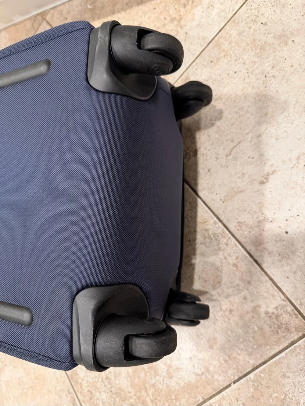 Tumi Navy Softside Carry-On Spinner